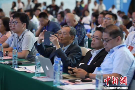 研討會現(xiàn)場圖?！■暮陚?攝