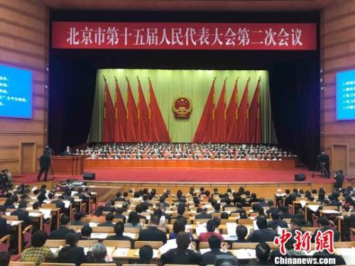 北京市十五屆人大二次會議14日開幕。北京市長陳吉寧向大會作政府工作報告。　尹力 攝